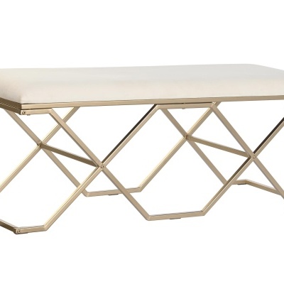 Banco retangular com estrutura metálica dourada e assento creme