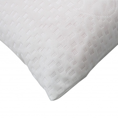 Travesseiro branco com textura quadrada sobre fundo branco