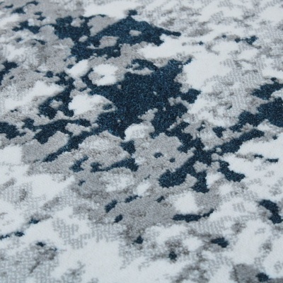 Tapete abstrato azul, cinzento e branco com textura felpuda