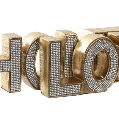 Decoração dourada com cristais na palavra HOLIDAY