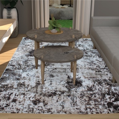 Tapete abstrato branco e castanho com mesa de centro redonda cinza e sofá cinza