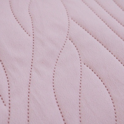 Tecido rosa com padrão ondulado de costura