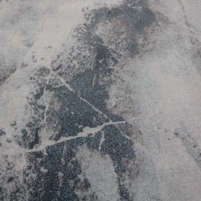 Textura rugosa cinzenta com manchas e rachaduras