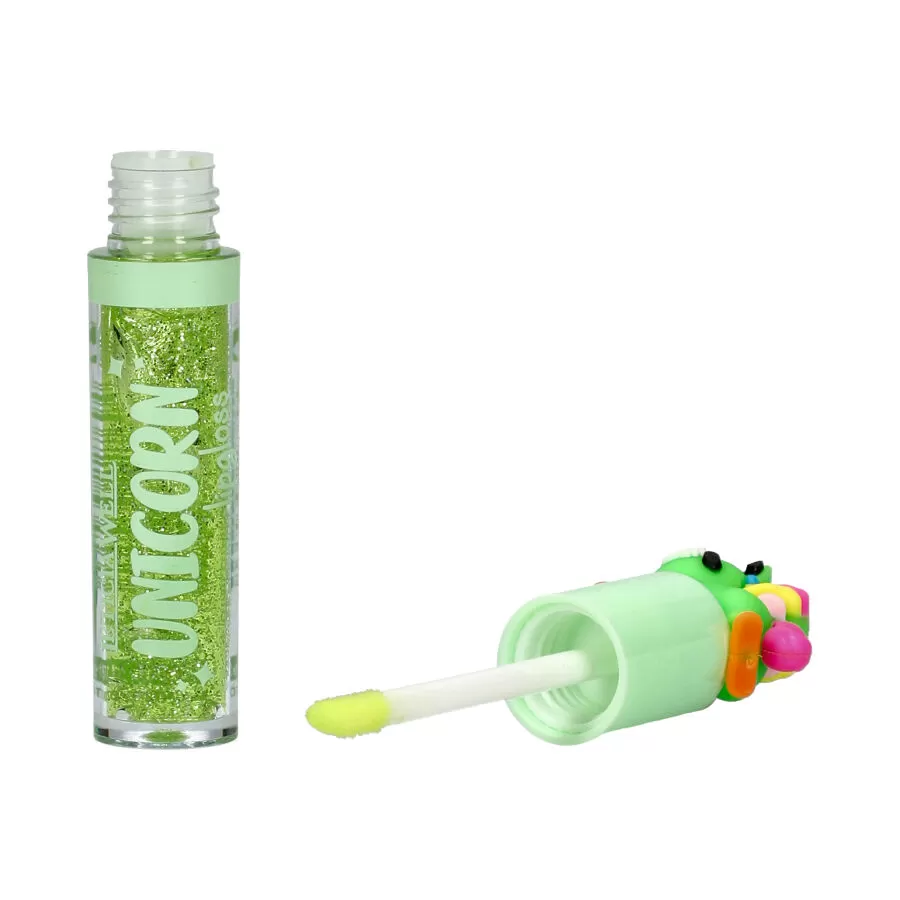 Frasco transparente com pó verde brilhante e tampa verde clara decorada com figura de unicornio colorida.