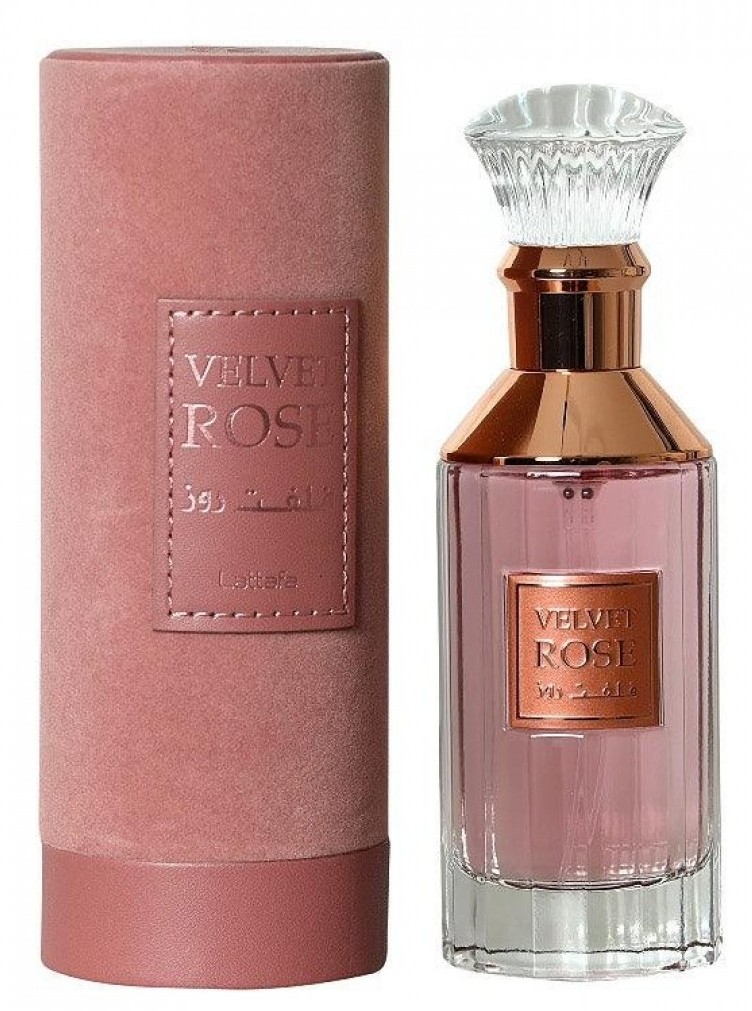 Frasco de perfume rosa com tampa transparente e embalagem cilíndrica rosa