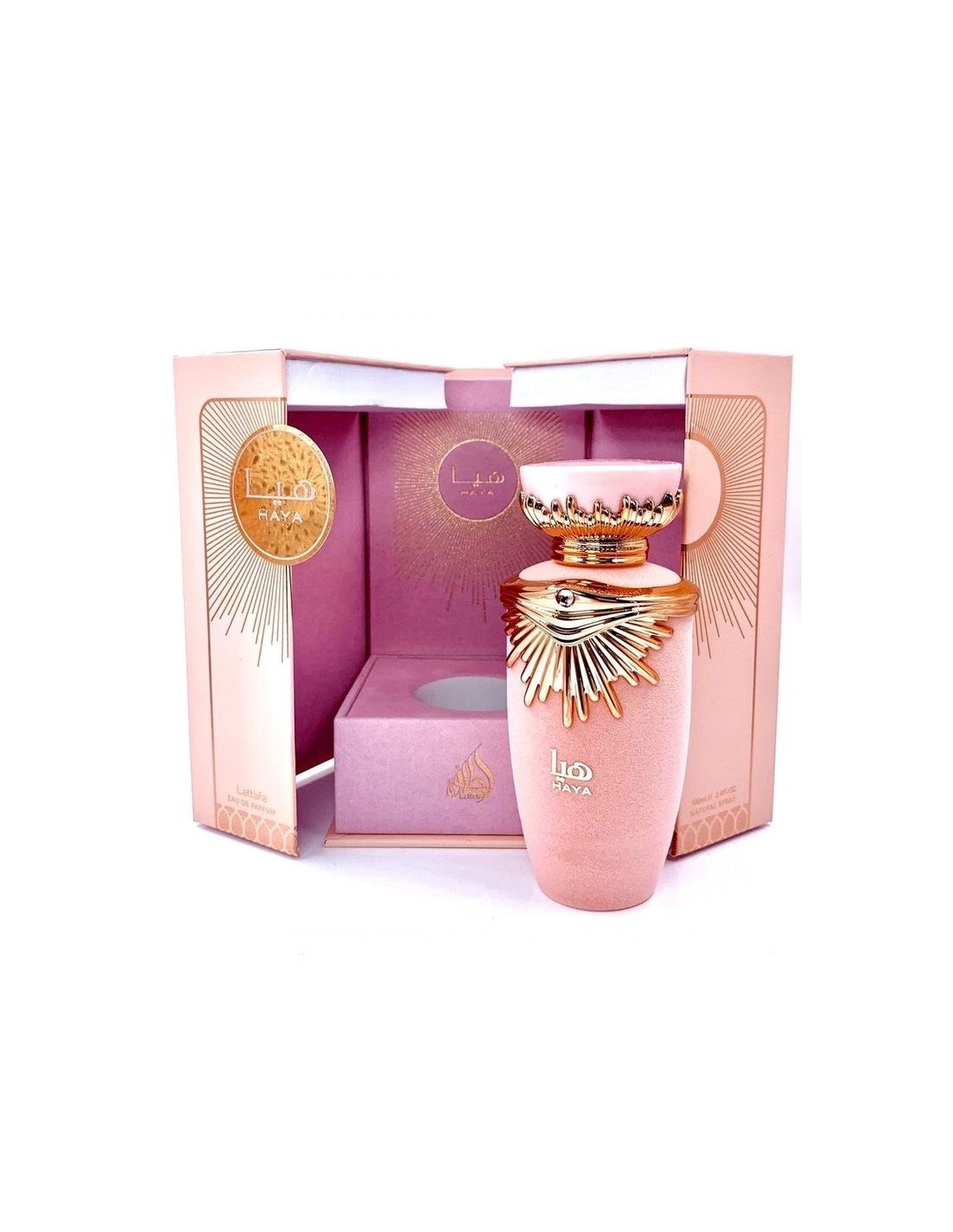 Perfume rosa com detalhes dourados em caixa rosa aberta