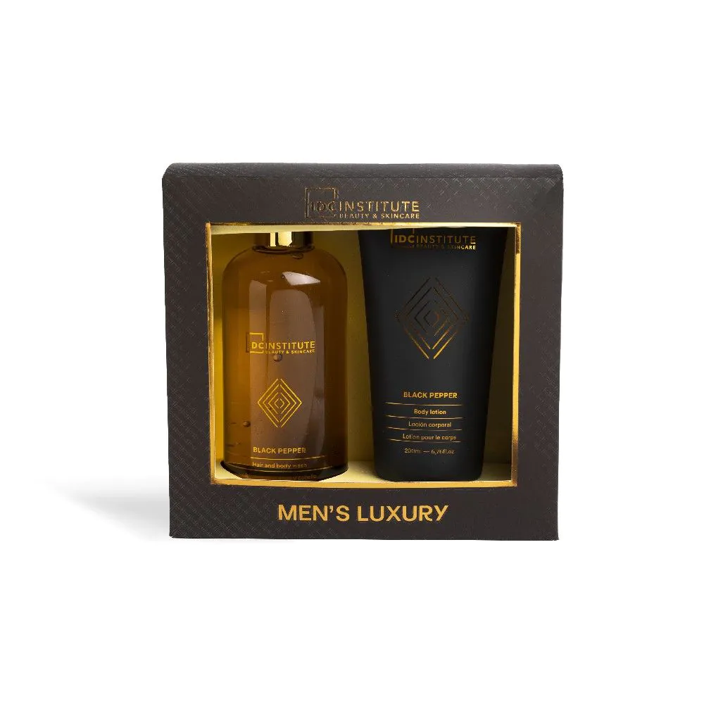 Conjunto de cosméticos de luxo masculino na embalagem preta com detalhes dourados.