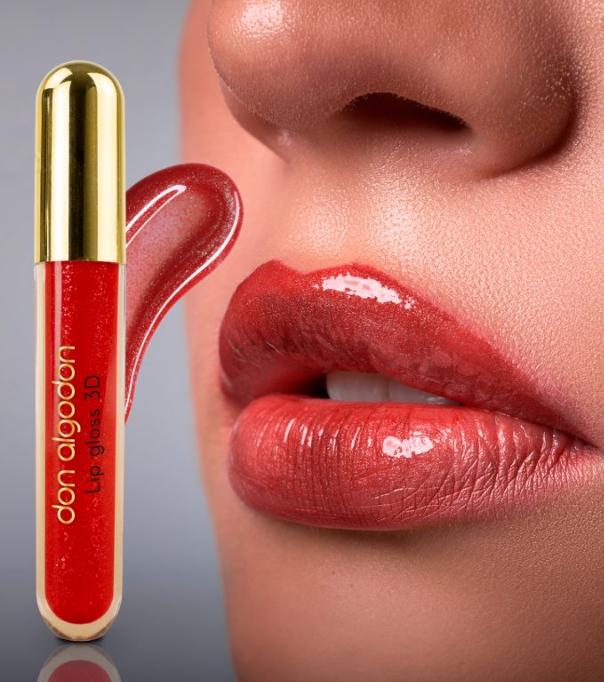 Batom gloss vermelho da marca Don Algodon com acabamento brilhante em lábios femininos.