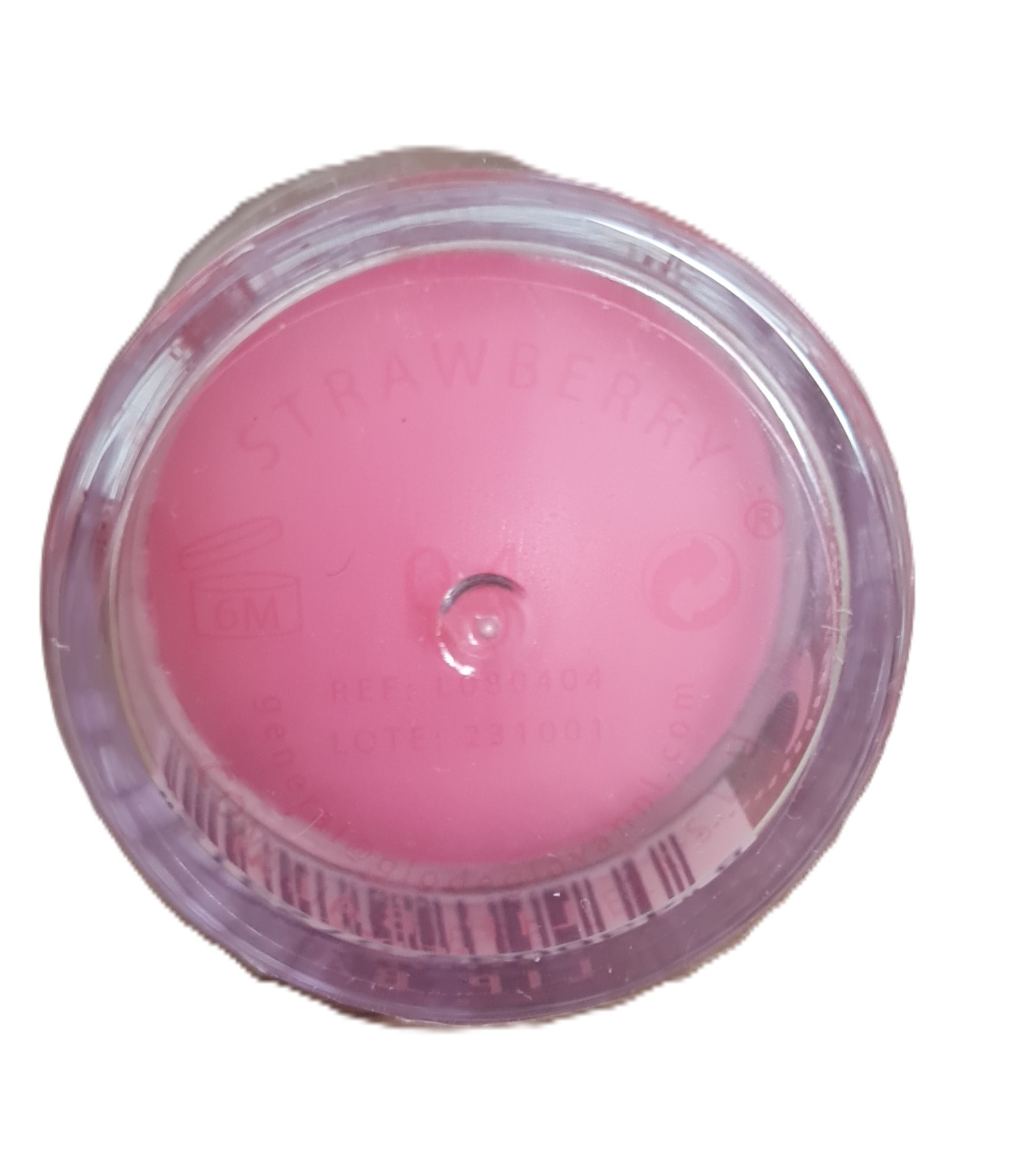 Vela pequena rosa em suporte transparente com texto strawberry e símbolos de validade