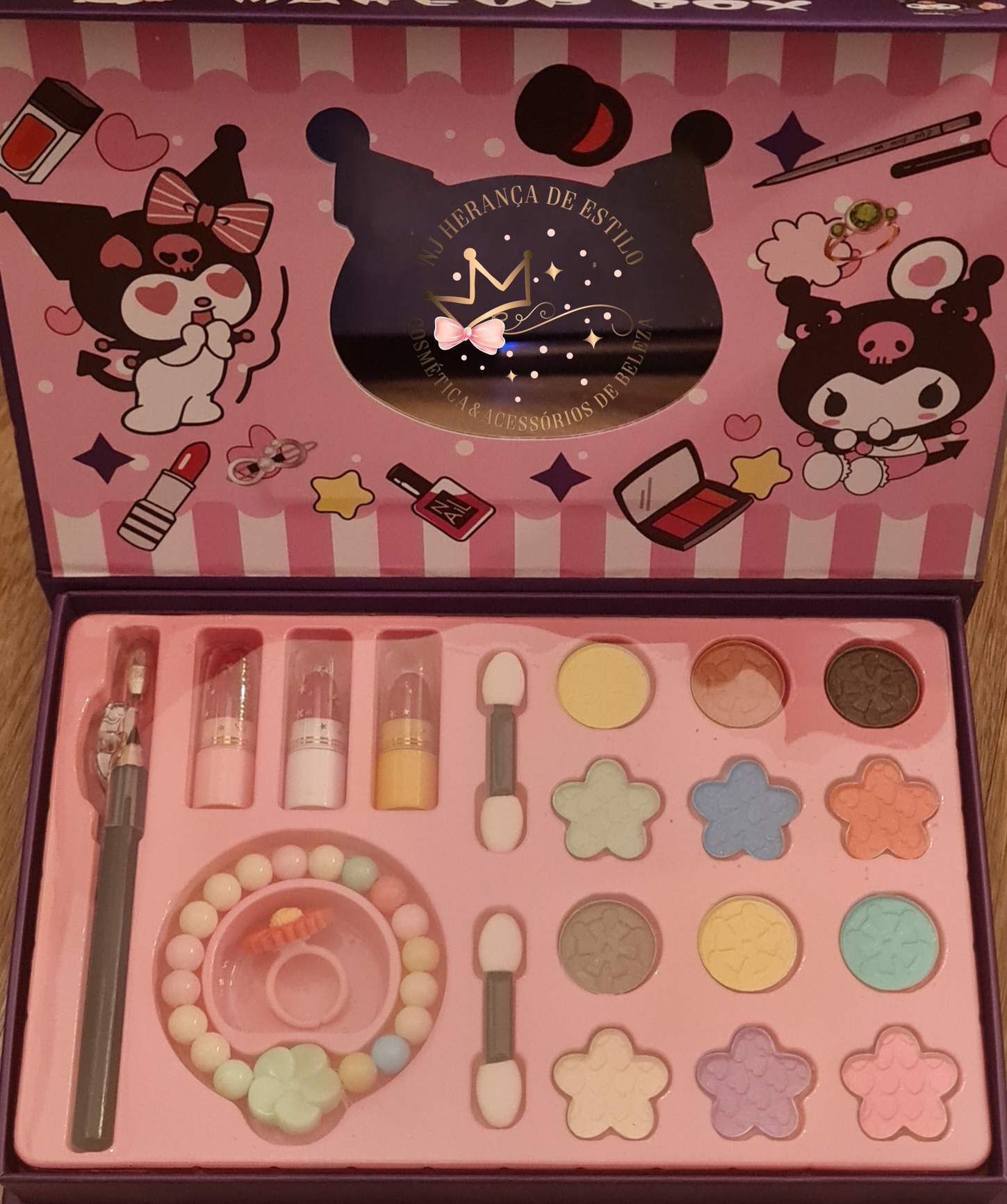 Conjunto maquilhagem infantil com sombras coloridas e acessórios em embalagem rosa com cartoon