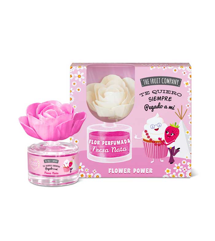 Frasco com tampa em forma de flor rosa e embalagem rosa decorada com flores e texto em espanhol.