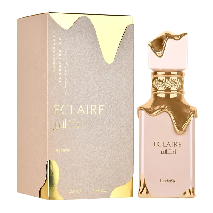 Frasco e caixa de perfume rosa claro e dourado com texto ECLAIRE Lattafa
