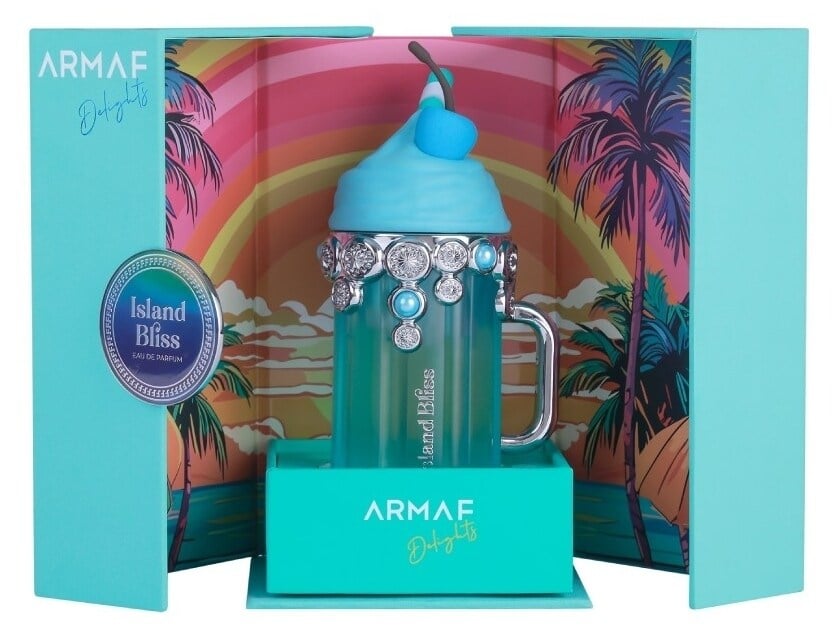 Frasco de perfume Armaf Island Bliss em embalagem azul com decoração tropical