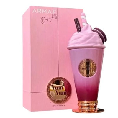 Perfume ARMAF Delights Yum Yum com embalagem e frasco cor-de-rosa decorados.