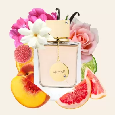 Perfume Armaf com flores e frutas ao fundo