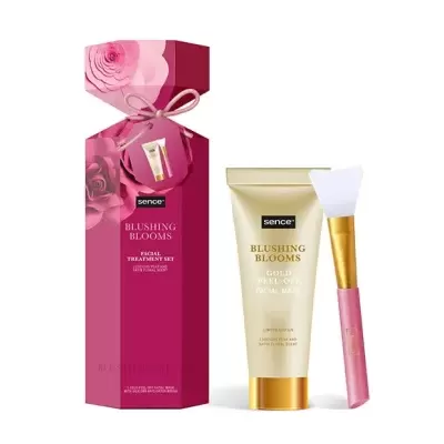 Conjunto facial Blushing Blooms da Sence com tubo creme dourado e pincel em embalagem rosa decorada com flores.
