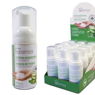 Espuma higienizante para mãos IDC Institute em embalagem branca com tampa transparente e caixa verde com várias unidades