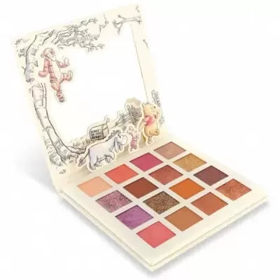 Paleta de sombras coloridas com ilustrações infantis na tampa