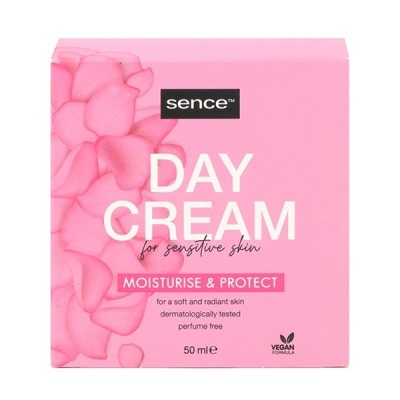 Caixa rosa de creme de dia para pele sensível com texto branco e rosa e desenho de pétalas