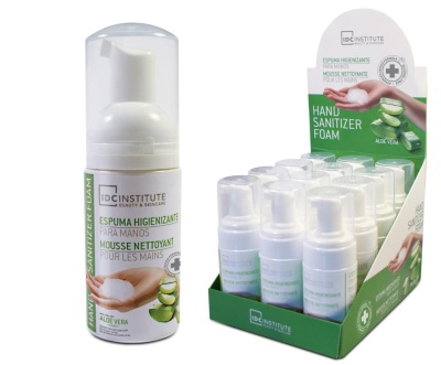 Espuma higienizante para mãos IDC Institute em embalagem branca com tampa transparente e caixa verde com várias unidades