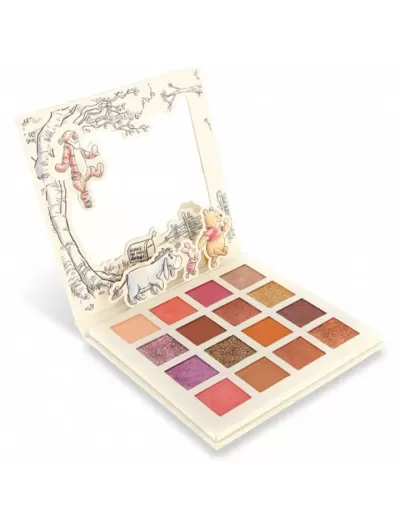 Paleta de sombras coloridas com ilustrações infantis na tampa