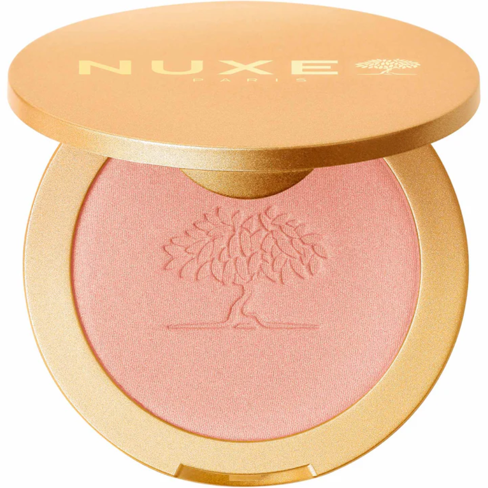 Nuxe - Prodigieux Floral La Poudre Pó Iluminador 9,5gr Pó compacto cor-de-rosa com embalagem dourada e texto NUXE PARIS