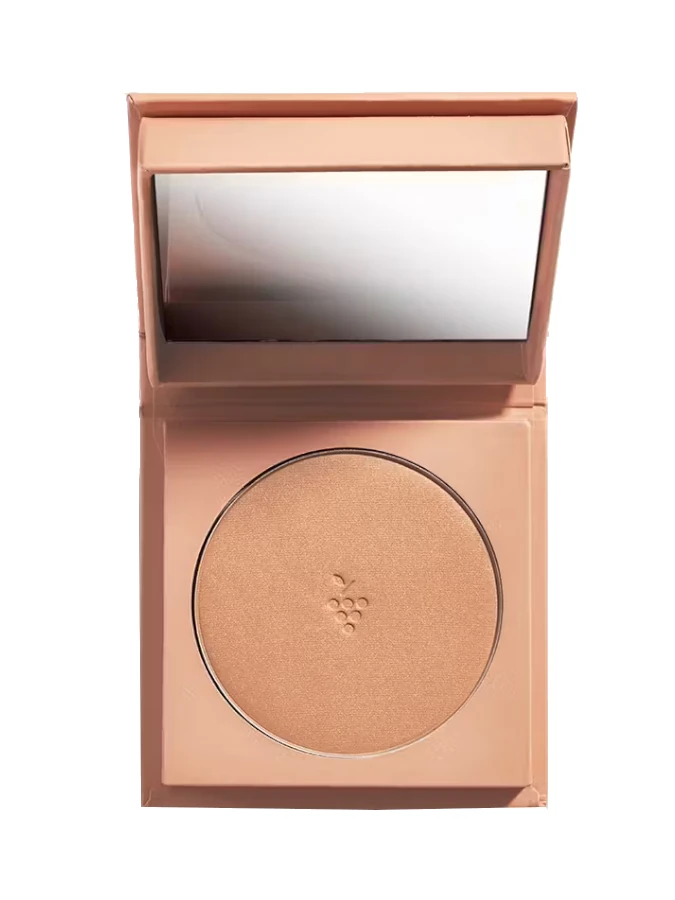 Caudalie - Vinocrush Pó Bronzeador Longa Duração 8,5Gr Pó compacto bege em estojo com espelho e relevo de uvas.