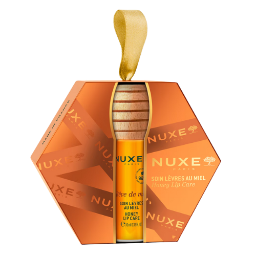 Nuxe - Coffret Rêve de Miel Cuidado Labial com Mel 10ml Cuidado labial Nuxe em embalagem alaranjada hexagonal com tubo amarelo e tampa de madeira