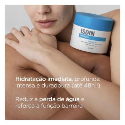 Frasco de creme ISDIN UREADIN CREAM 10 branco com tampa azul em mãos femininas.