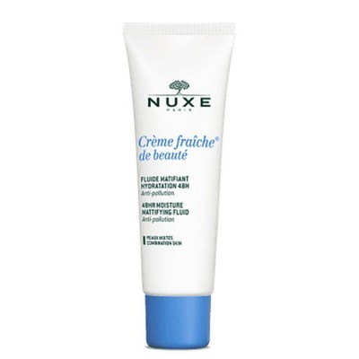 Tubo branco de creme facial NUXE com tampa azul e texto em azul e preto