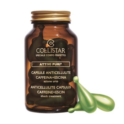 Frasco âmbar com cápsulas anticelulite Collistar e duas cápsulas verdes ao lado