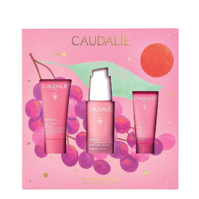 Pack Caudalie com produtos de cuidado facial em embalagem cor-de-rosa com ilustração de uvas.