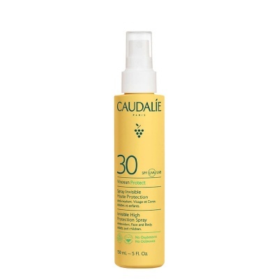 Spray protetor solar Caudalie SPF 30 amarelo com tampa branca
