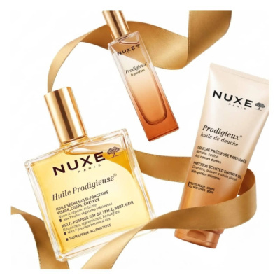 Produtos NUXE Huile Prodigieuse, perfume, óleo seco multiusos e óleo de duche com fita dourada