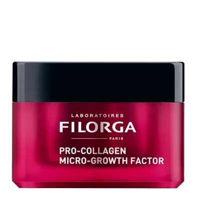 Frasco rosa metálico de creme cosmético Filorga com tampa preta