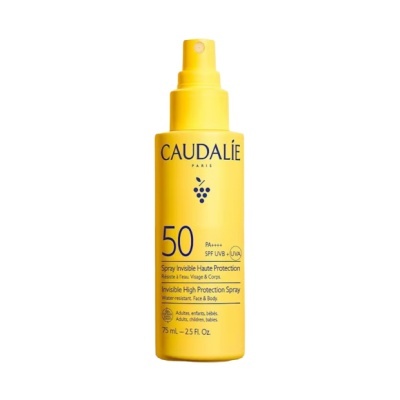 Frasco amarelo de spray de proteção solar Caudalie FPS 50