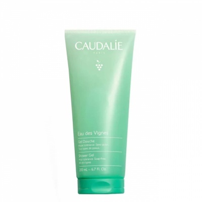 Tubo de gel de duche Caudalie verde com texto branco.