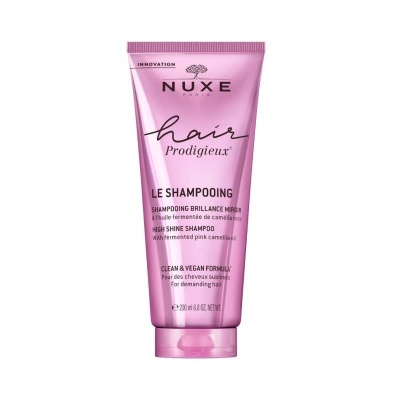 Tubo rosa metálico do shampoo Nuxe Hair Prodigieux Le Shampooing