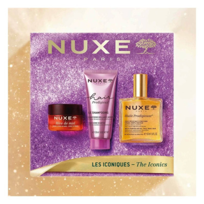 Conjunto de três produtos NUXE Paris em embalagem roxa brilhante.