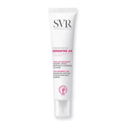 Tubo branco de creme SVR com texto em cinzento e rosa e tampa transparente