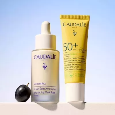 Sérum Vinoperfect e creme solar 50+ Caudalie com uva preta