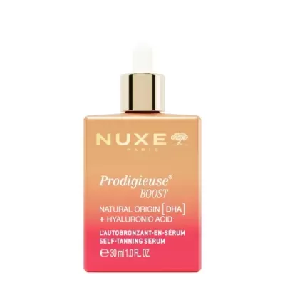 Serum autobronzeador Nuxe Prodigieuse Boost em frasco amarelo e vermelho com conta-gotas