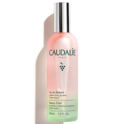 Frasco de cosmético Rosa e Verde Caudalie Eau de Beauté 100ml