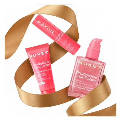 Três produtos cosméticos Nuxe Prodigieuse [Hyalu] Boost em rosa com fita dourada