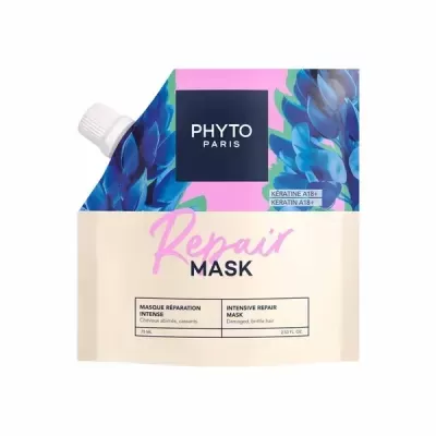 Embalagem de máscara capilar Phyto Paris Repair Mask em tons azul, rosa e bege.