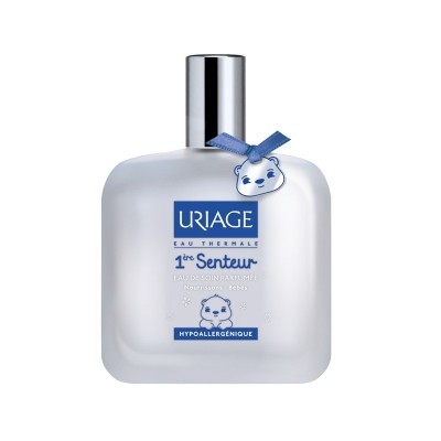 Frasco branco fosco de perfume URIAGE 1re Senteur com etiquetas azuis e tampa prateada
