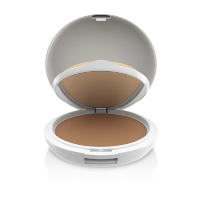 Pó compacto castanho em embalagem branca redonda com espelho