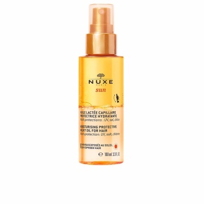 Frasco laranja de óleo capilar hidratante protetor NUXE sun 100 ml com tampa gota dourada