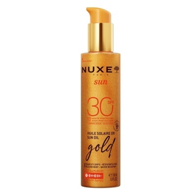 Frasco dourado de óleo solar NUXE Sun SPF 30 com tampa amarela