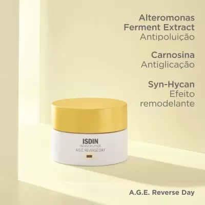 Frasco branco com tampa dourada e texto de ingredientes num fundo amarelo claro